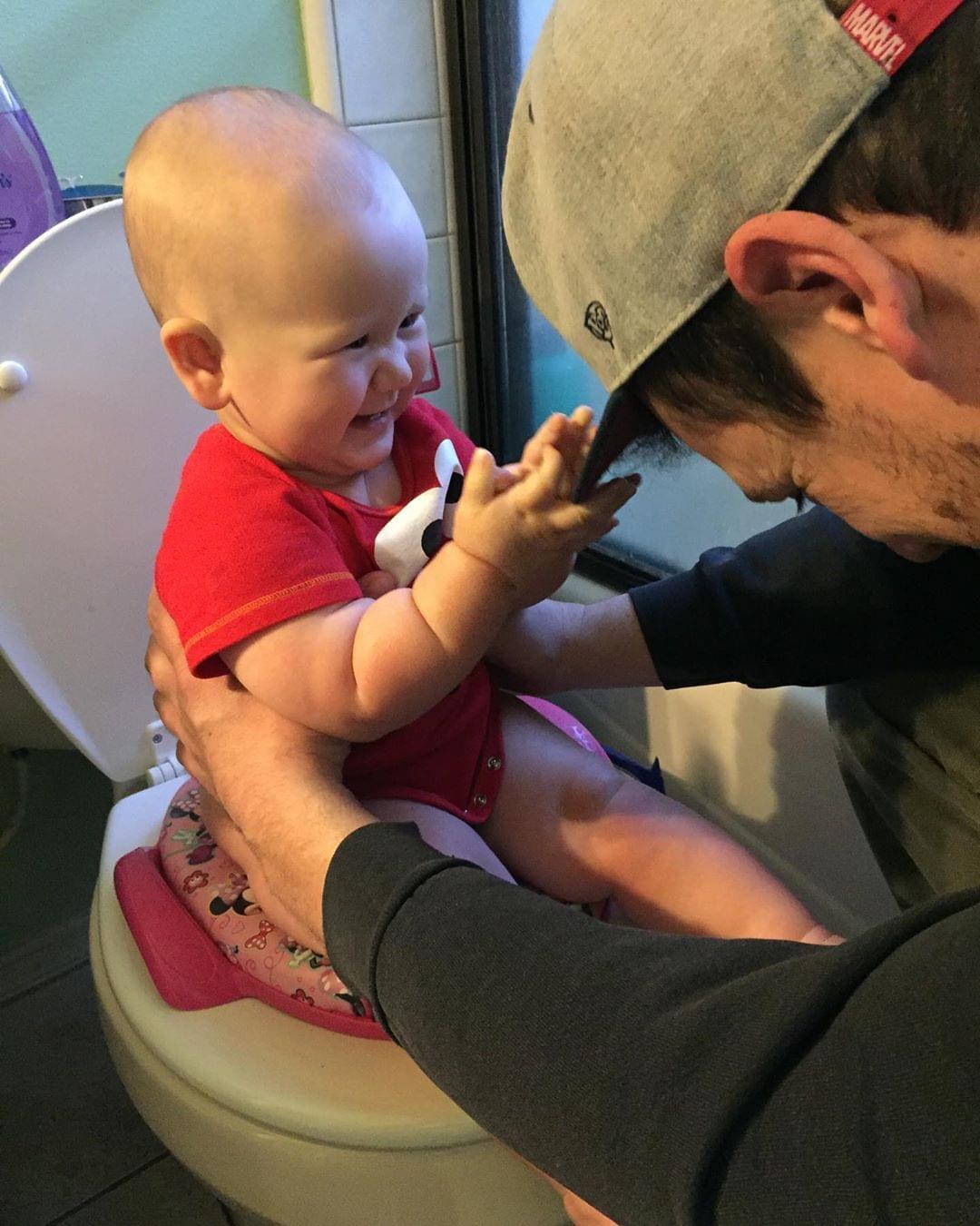 dad pottying baby